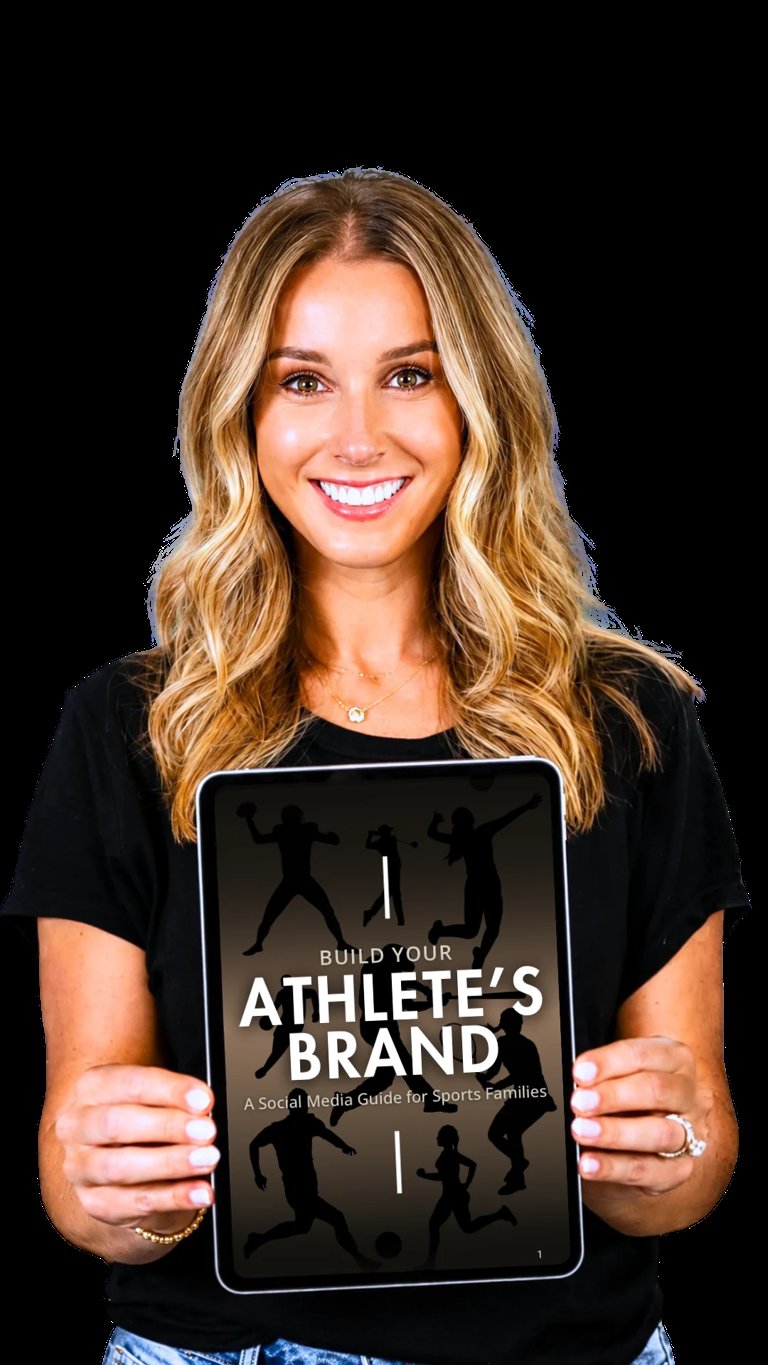 Woman holding tablet displaying Build Your Athletes Brand guide, smiling at camera against black background